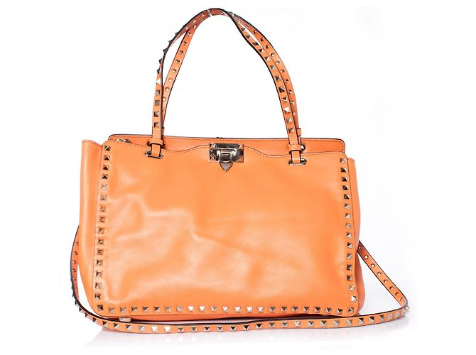 Valentino Garavani, Borsa tote Rockstud Trapeze arancione. - vista 3