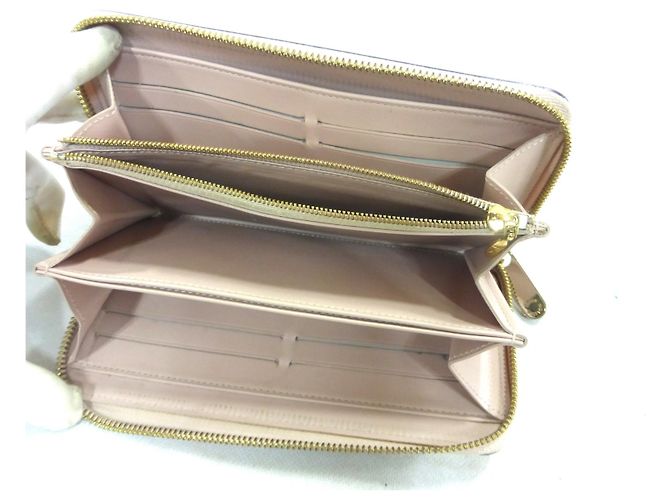 Louis Vuitton Zippy Charol Polvo Beige - ES4103 - vista 16