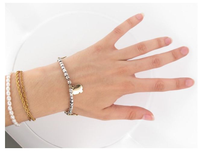 Dodo Pomellato BRACCIALE DODO MINI GRANELLI T18 soldi 3 CIONDOLI ANIMALI LEONE IN ORO GIALLO 18K - vista 13