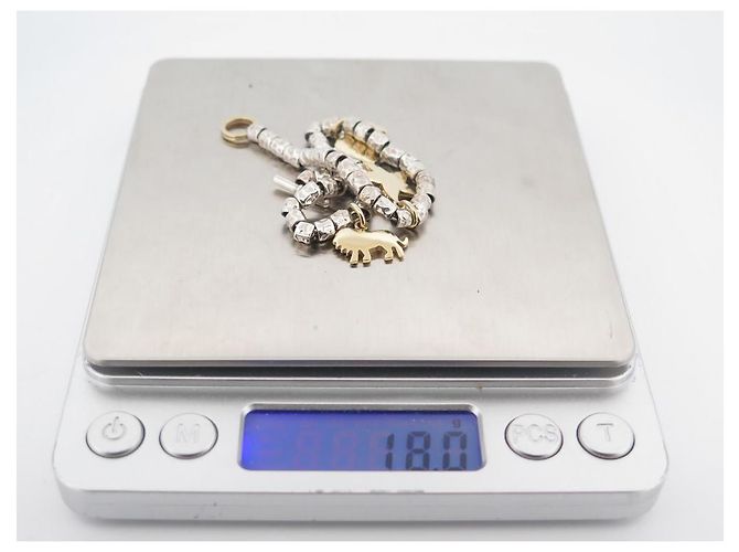 Dodo Pomellato BRACCIALE DODO MINI GRANELLI T18 soldi 3 CIONDOLI ANIMALI LEONE IN ORO GIALLO 18K - vista 7