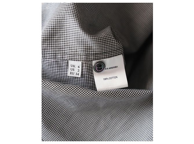 JW Anderson J.W. Camicia Anderson con polsini borchiati e micro-check in cotone bianco e nero - vista 5