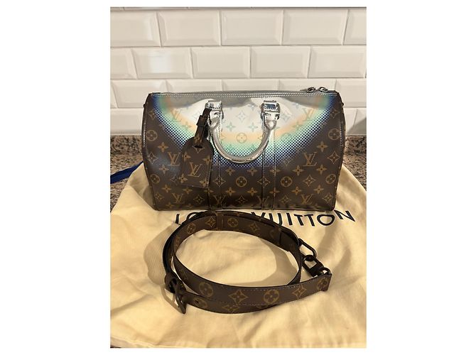 Abbesses Louis Vuitton Nebulosa Keepall 35 Marrone Argento - vista 13