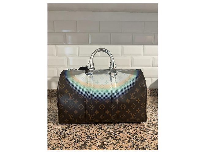 Abbesses Louis Vuitton Nebulosa Keepall 35 Marrone Argento - vista 2