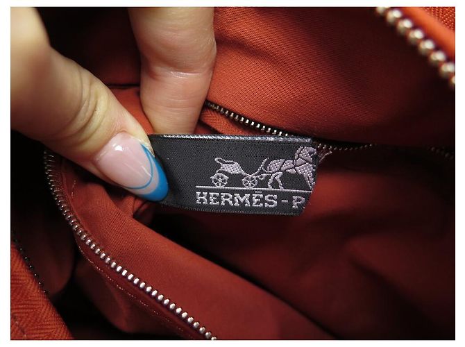 Hermès NOVA BOLSA HERMES ACAPULCO PM CABAS LONA E COURO LARANJA NOVA BOLSA DE MÃO - vista 10