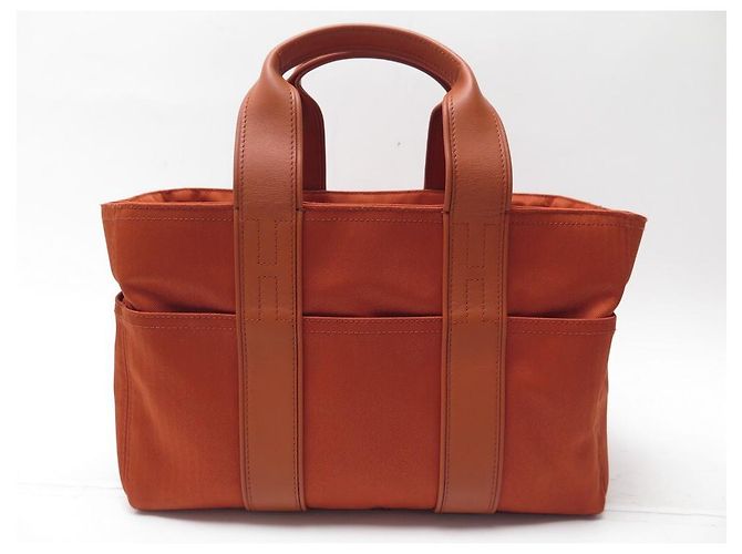 Hermès NOVA BOLSA HERMES ACAPULCO PM CABAS LONA E COURO LARANJA NOVA BOLSA DE MÃO - vista 2