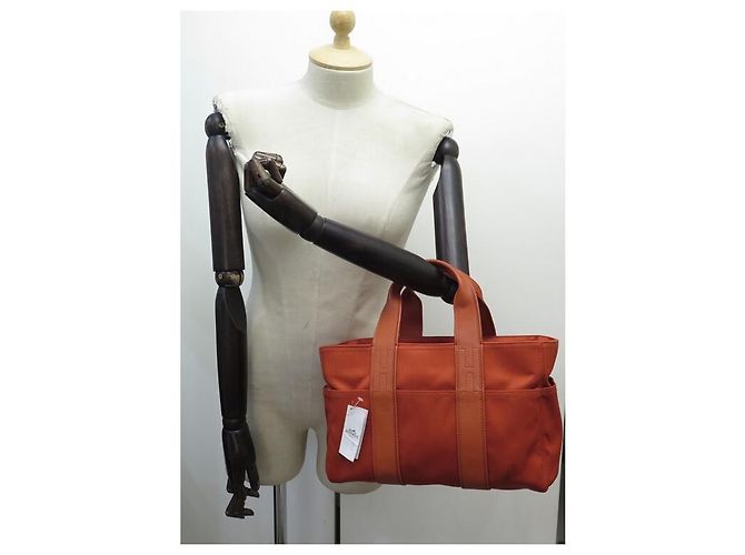 Hermès NOVA BOLSA HERMES ACAPULCO PM CABAS LONA E COURO LARANJA NOVA BOLSA DE MÃO - vista 6