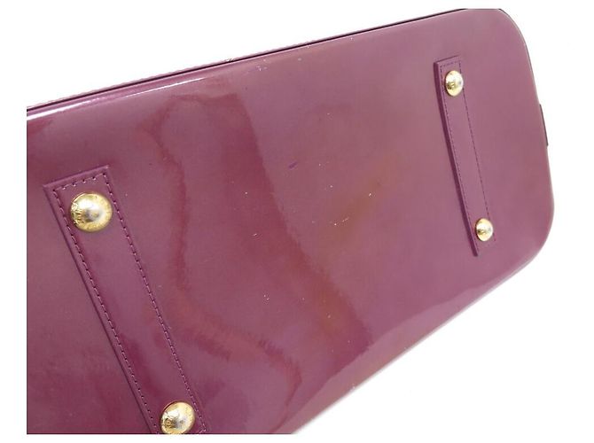 BORSA A MANO LOUIS VUITTON ALMA GM IN PELLE MONOGRAM VERNICE FUCSIA Fuschia - vista 10