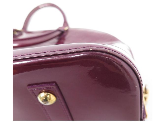 BORSA A MANO LOUIS VUITTON ALMA GM IN PELLE MONOGRAM VERNICE FUCSIA Fuschia - vista 11