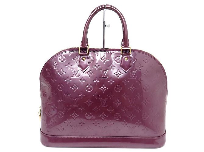BORSA A MANO LOUIS VUITTON ALMA GM IN PELLE MONOGRAM VERNICE FUCSIA Fuschia - vista 2