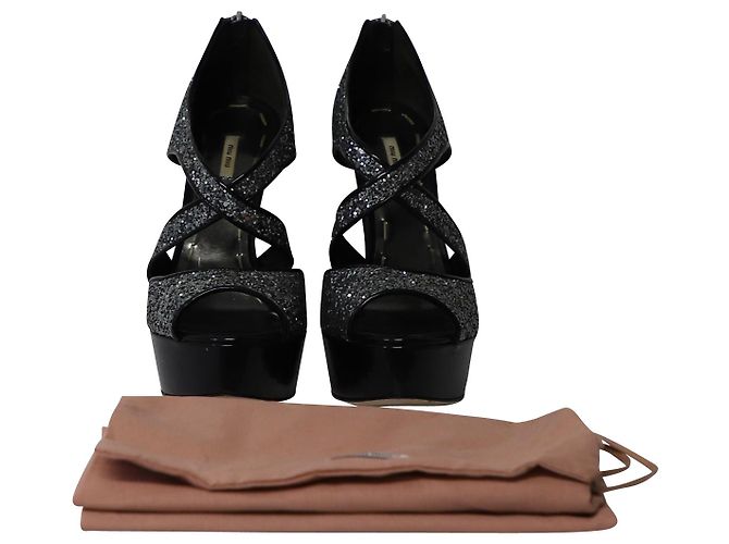 Tacchi Miu Miu con plateau in glitter argento Metallico - vista 11