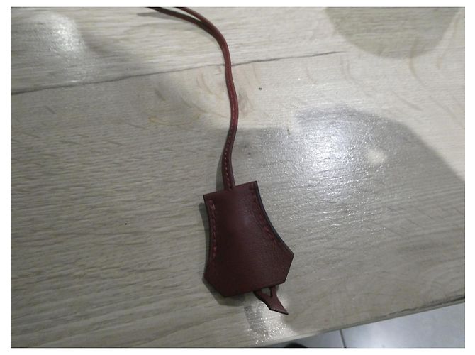 clochette , cerniera per nuovo lucchetto Hermès per borsa, scatola e sacchetto per la polvere Hermès Rosso - vista 2