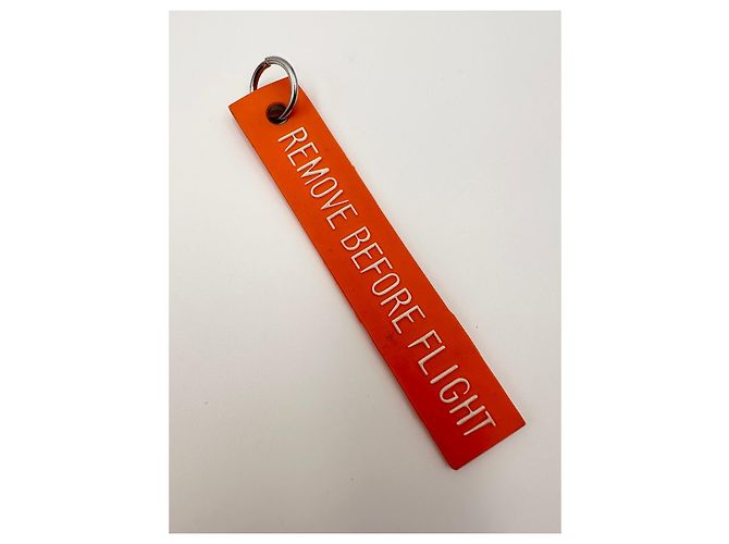 DIOR accessorio  in gomma "Remove Before Flight" - vista 4