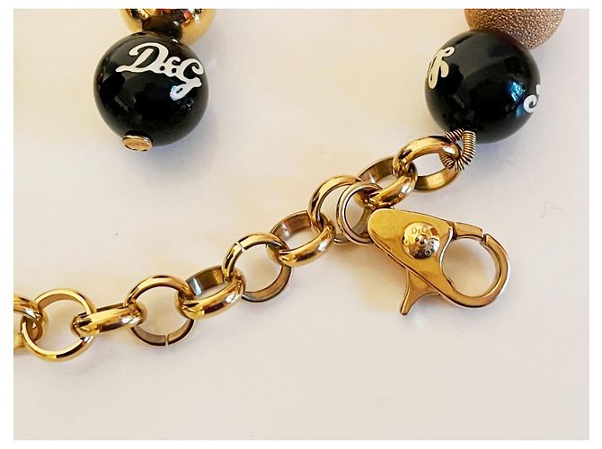 Bellissima luminosa parure acciaio dorato e perle bracciale più orecchini DOLCE & GABBANA con, perle bianche, oro e nere D'oro - vista 11