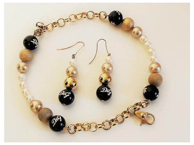 Bellissima luminosa parure acciaio dorato e perle bracciale più orecchini DOLCE & GABBANA con, perle bianche, oro e nere D'oro - vista 9