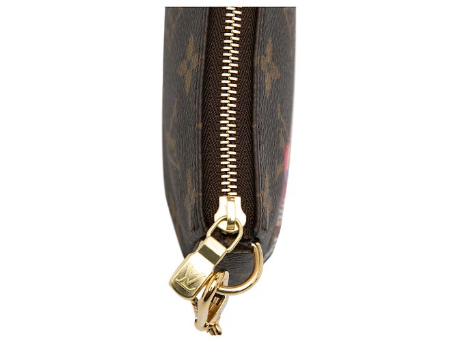 Louis Vuitton Monogramma Marrone Vivienne Natale Mini Pochette Accessori - vista 8