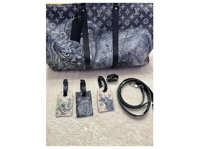 Abbesses Louis Vuitton Keepall 55 Safari Blu navy - vista 16