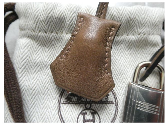 Hermès campanella, cerniera e lucchetto Hermes nuovi per borsa Hermes, scatola e sacchetto antipolvere. Marrone chiaro - vista 2