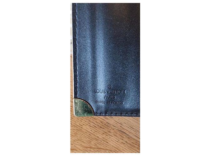 Portafoglio Louis Vuitton in pelle nero e oro D'oro - vista 8