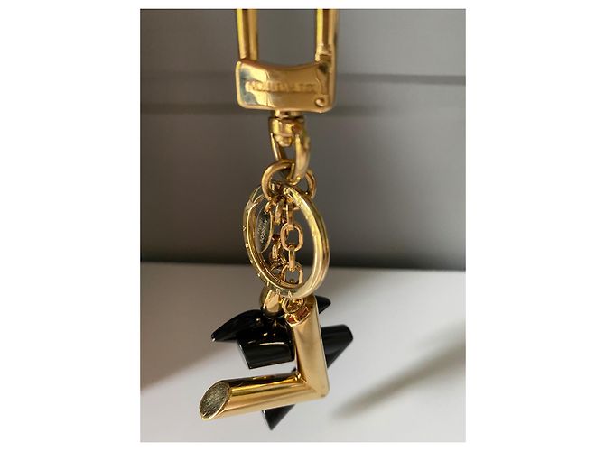 Louis Vuitton Charm per borsa a forma di twist nero Gold hardware - vista 14