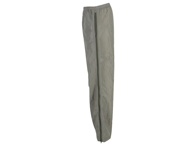 Acne Studios Calças Shell Track com acabamento em veludo e zíper em nylon verde Caqui - vista 2