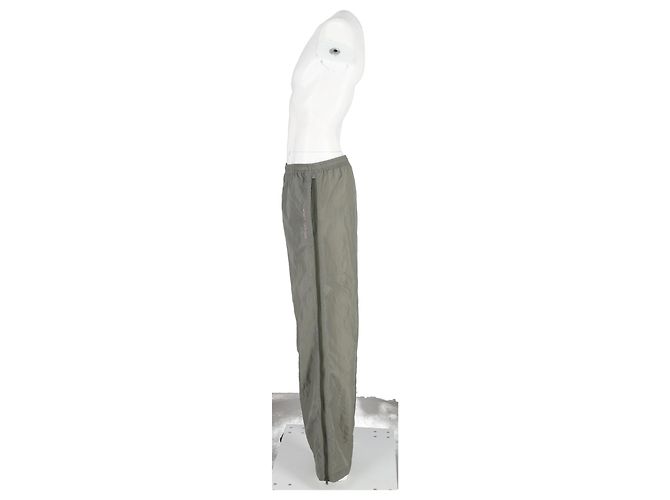 Acne Studios Calças Shell Track com acabamento em veludo e zíper em nylon verde Caqui - vista 5