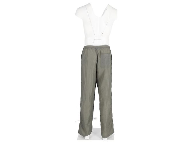 Acne Studios Calças Shell Track com acabamento em veludo e zíper em nylon verde Caqui - vista 6