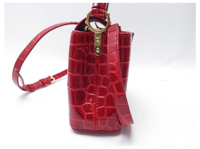 BORSA A MANO MINI LOUIS VUITTON CAPUCINES IN PELLE DI COCCODRILLO ROSSO - vista 4
