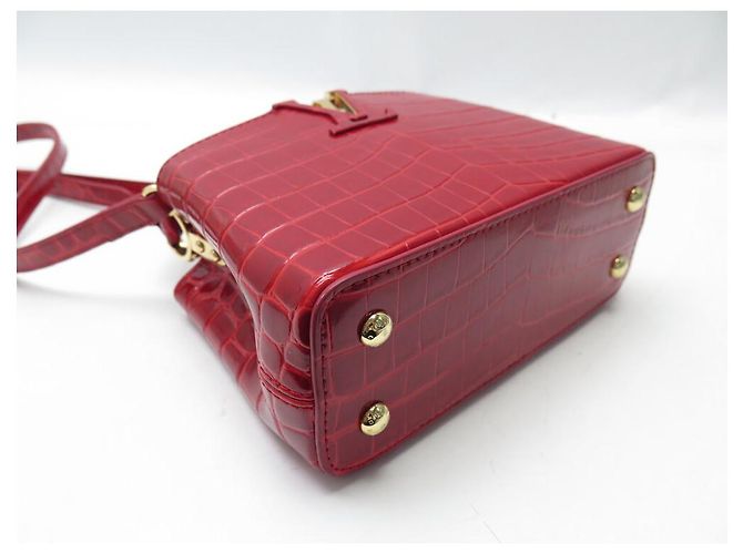BORSA A MANO MINI LOUIS VUITTON CAPUCINES IN PELLE DI COCCODRILLO ROSSO - vista 5