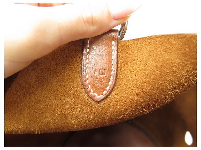 Hermès BORSA A MANO HERMES SEAU MANGEOIRE IN PELLE D'ORO GULLIVER Marrone - vista 11