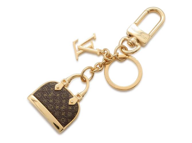 Portachiavi Louis Vuitton Alma Monogram Marrone D'oro - vista 3