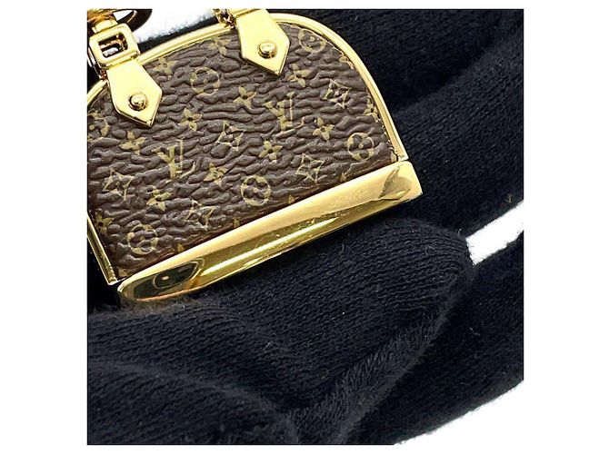 Portachiavi Louis Vuitton Alma Monogram Marrone D'oro - vista 5