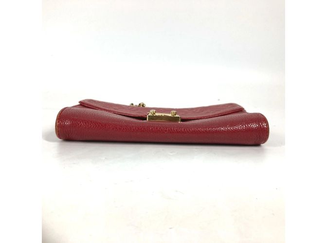 Cartera de Cadena Monogram Empreinte Louis Vuitton Roja - vista 5
