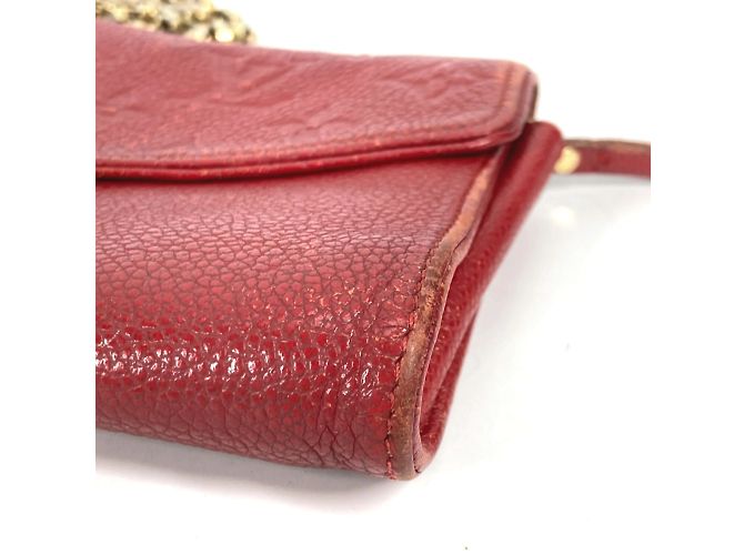 Cartera de Cadena Monogram Empreinte Louis Vuitton Roja - vista 6