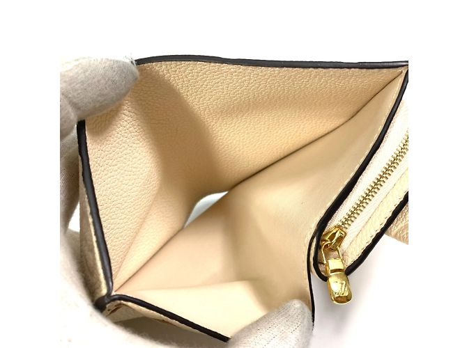 Cartera Metis Trifold Monogram Empreinte Louis Vuitton Beige - vista 10