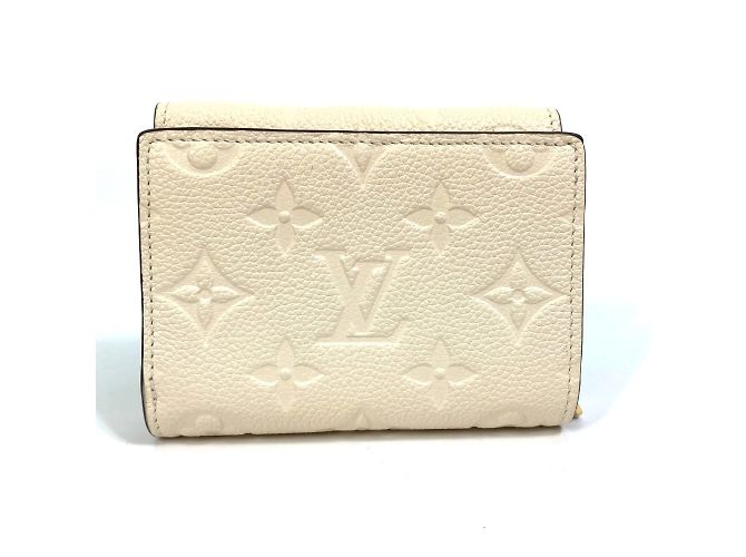 Cartera Metis Trifold Monogram Empreinte Louis Vuitton Beige - vista 2