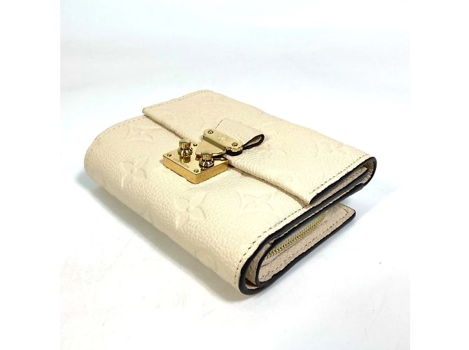 Cartera Metis Trifold Monogram Empreinte Louis Vuitton Beige - vista 3
