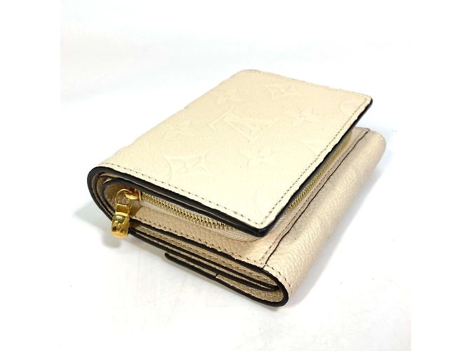 Cartera Metis Trifold Monogram Empreinte Louis Vuitton Beige - vista 4