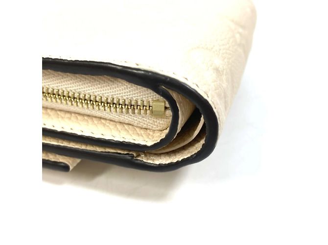 Cartera Metis Trifold Monogram Empreinte Louis Vuitton Beige - vista 6