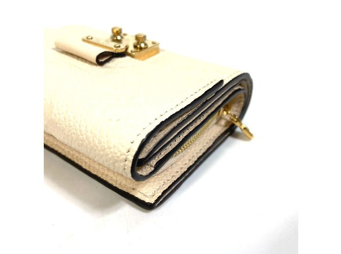 Cartera Metis Trifold Monogram Empreinte Louis Vuitton Beige - vista 7