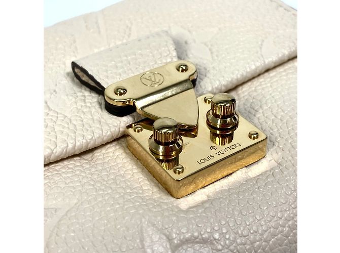 Cartera Metis Trifold Monogram Empreinte Louis Vuitton Beige - vista 8