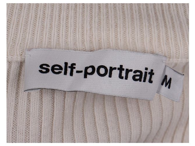 Self portrait Rippstrickpullover mit Rüschensaum aus cremefarbener Baumwolle - vista 5