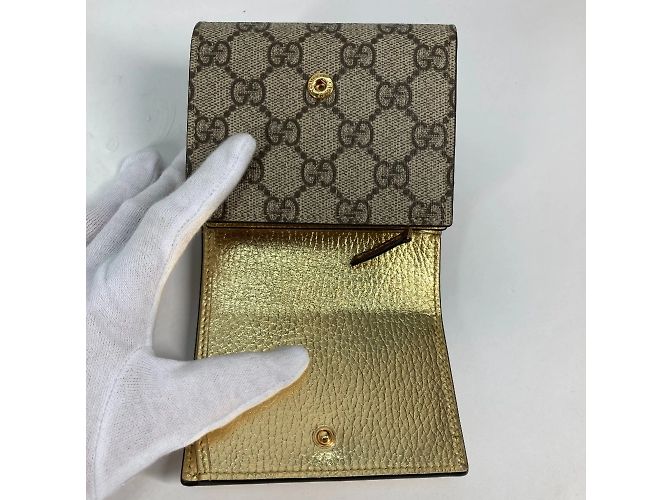 Billetera bi-fold Gucci en oro Dorado - vista 10