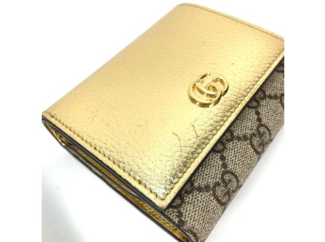 Billetera bi-fold Gucci en oro Dorado - vista 7