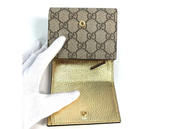 Billetera bi-fold Gucci en oro Dorado - vista 9