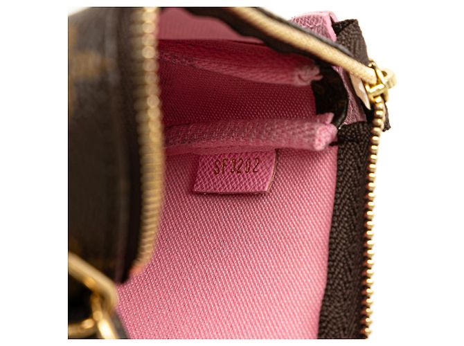 Mini Pochette Accessoires Vivienne in Monogramma Marrone di Louis Vuitton a Parigi - vista 7
