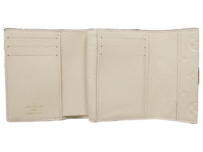 Billetera Trifold Monogram Empreinte Louis Vuitton - vista 6