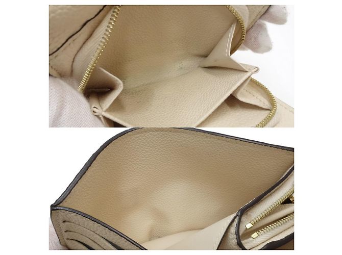 Billetera Trifold Monogram Empreinte Louis Vuitton - vista 9