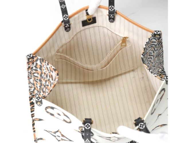 Borsa tote On the Go GM Monogram Jungle di Louis Vuitton Bianco Arancione - vista 13