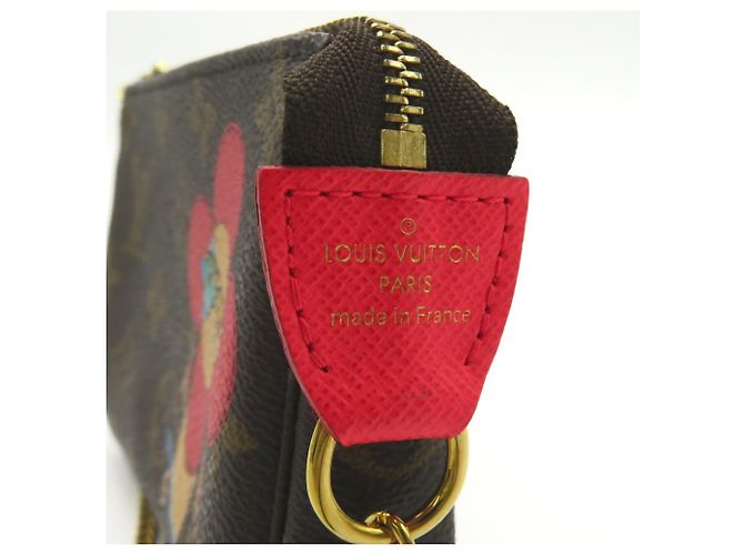 Pochette Accessoires Vivienne di Louis Vuitton Marrone - vista 9