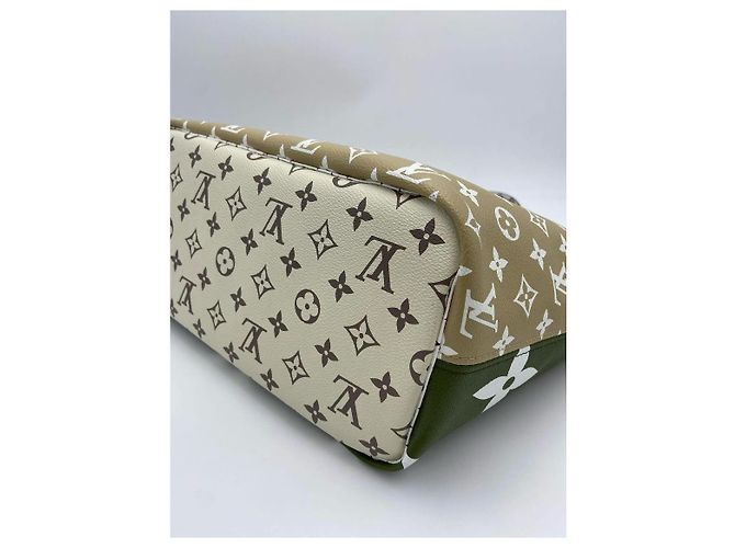 Cité Louis Vuitton Neverfull MM Monogram Giant Beige - vista 12